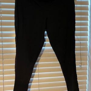 Black leggings with geometric mesh sides